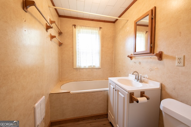 full bathroom featuring toilet, crown molding, shower / washtub combination, vanity, and hardwood / wood-style flooring