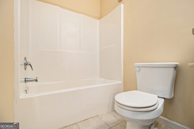 bathroom featuring toilet and tile flooring