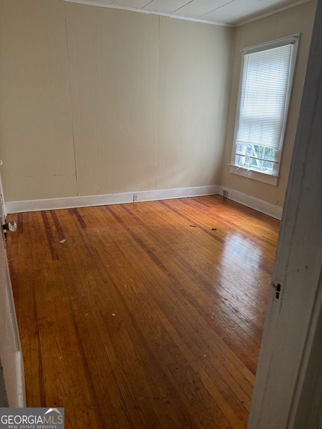 unfurnished room featuring light wood-type flooring