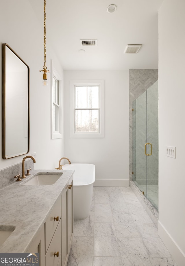 bathroom featuring vanity and separate shower and tub