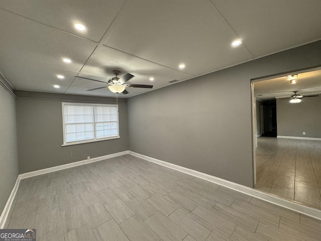 empty room featuring ceiling fan