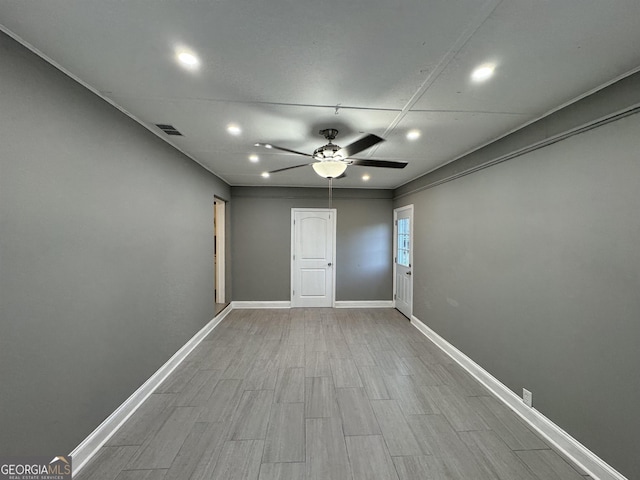 spare room featuring ceiling fan