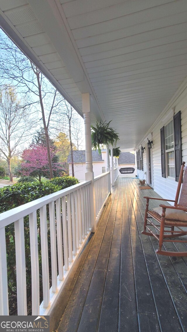 deck with covered porch