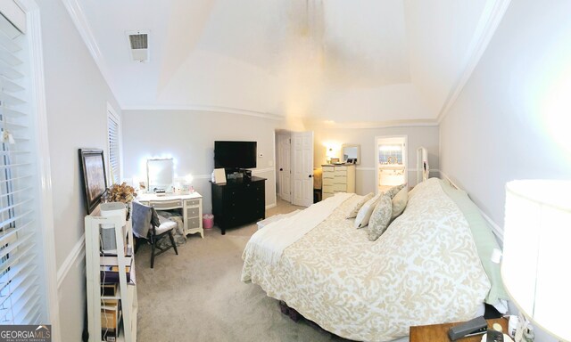 bedroom featuring light colored carpet and crown molding