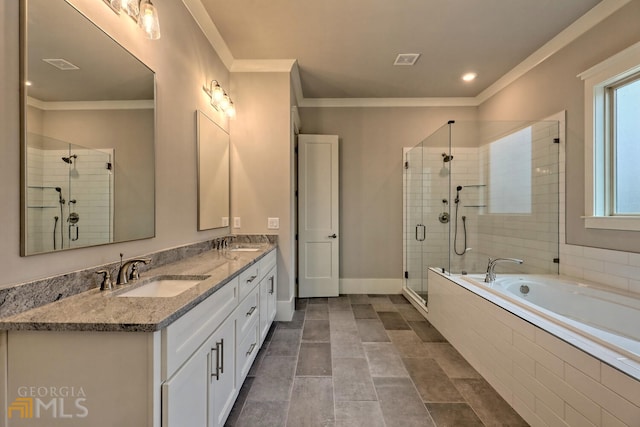 bathroom featuring separate shower and tub, crown molding, double vanity, and tile floors