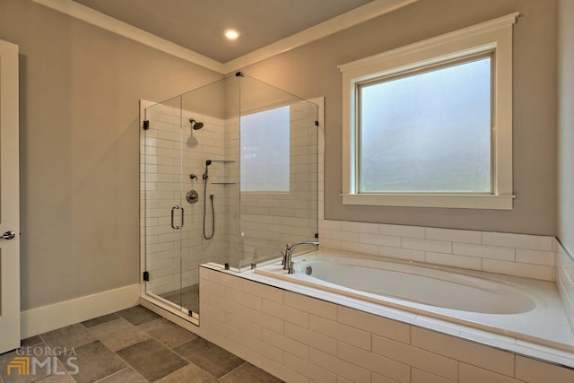 bathroom featuring tile flooring and plus walk in shower