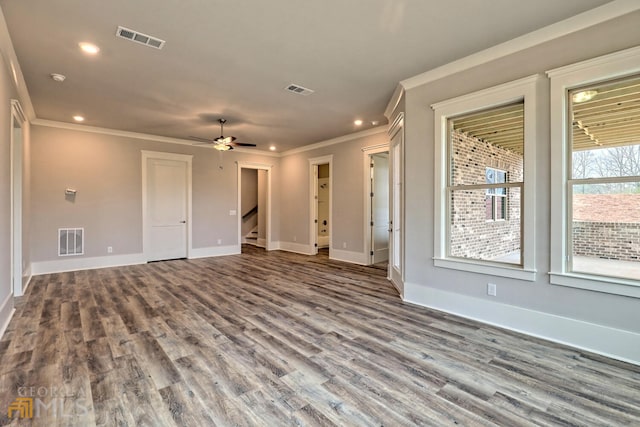 unfurnished room featuring crown molding, dark hardwood / wood-style flooring, and ceiling fan