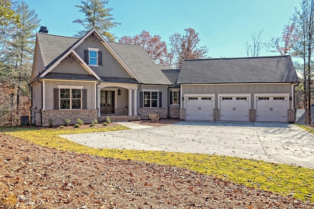 craftsman-style home with covered porch and a garage