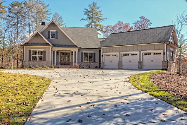 craftsman inspired home with a garage