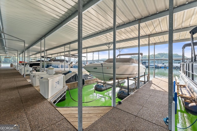 dock area featuring a water view