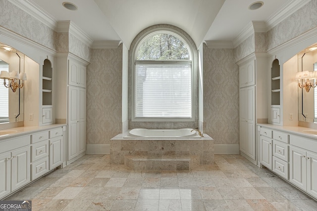 bathroom featuring tile floors, tiled bath, vanity with extensive cabinet space, built in shelves, and ornamental molding