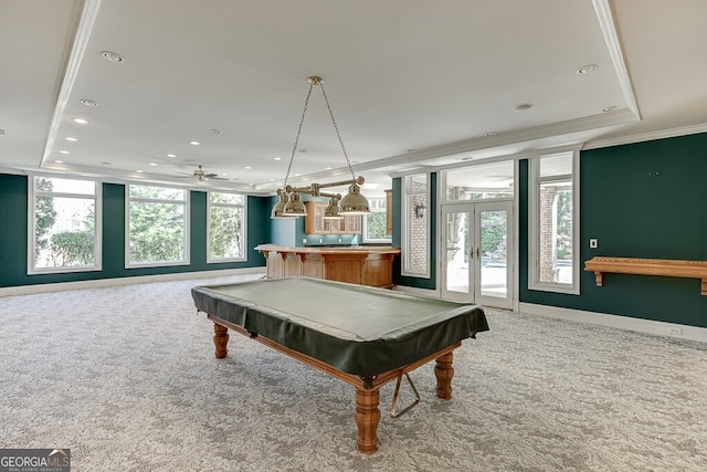 rec room with light carpet, french doors, a tray ceiling, and pool table