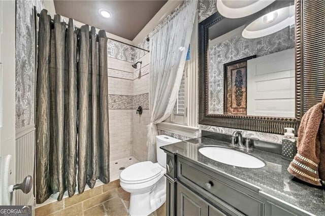 bathroom with walk in shower, oversized vanity, toilet, and tile flooring