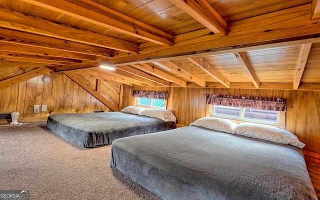 carpeted bedroom with wood walls, beam ceiling, and wooden ceiling