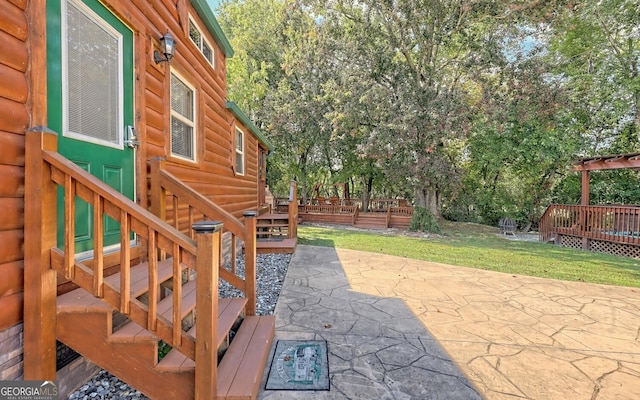 view of patio featuring a wooden deck