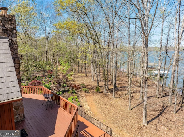 deck featuring a water view