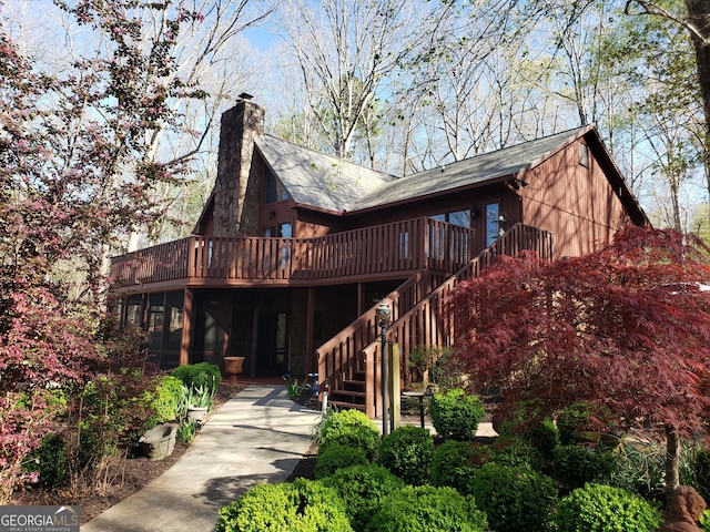 view of front of house featuring a wooden deck