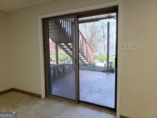 doorway featuring light tile flooring