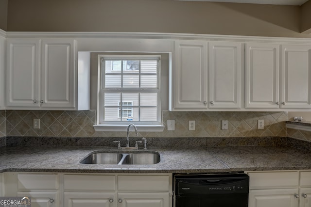 kitchen featuring tasteful backsplash, white cabinetry, dishwasher, and sink