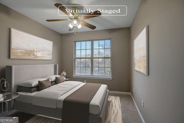 bedroom with carpet floors and ceiling fan