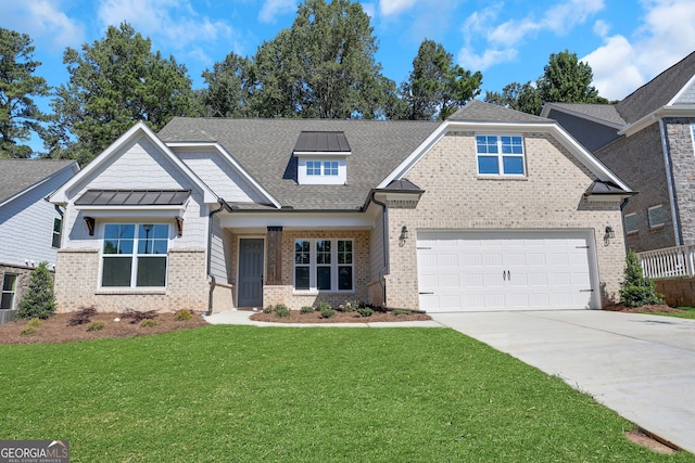 craftsman-style house with a garage and a front lawn