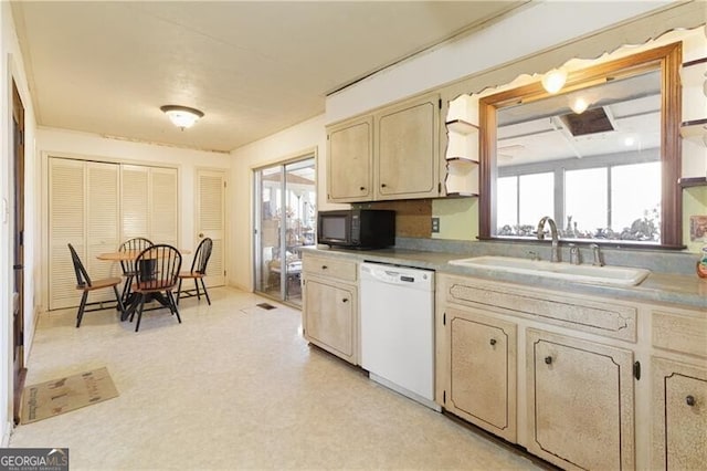 kitchen with sink and dishwasher