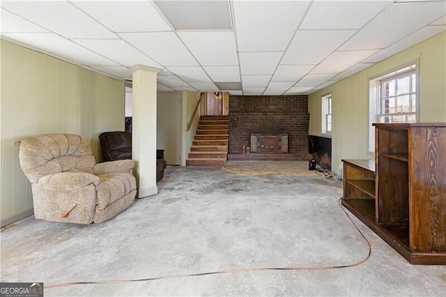 living area featuring concrete flooring