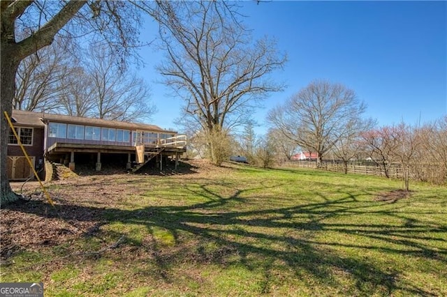 view of yard with a wooden deck