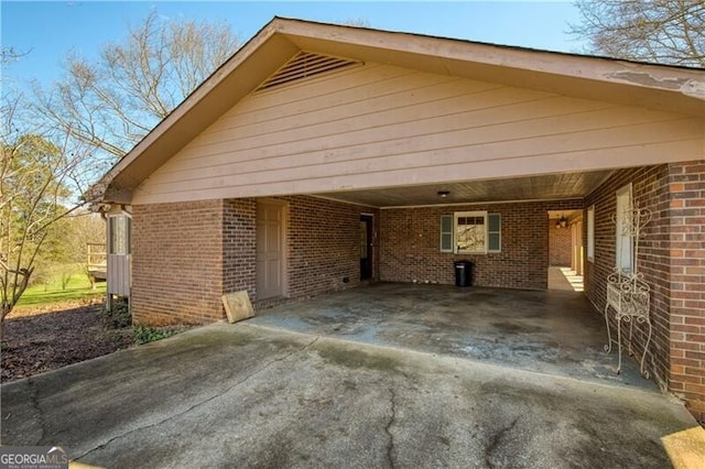 exterior space featuring a carport