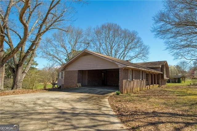 exterior space with a carport