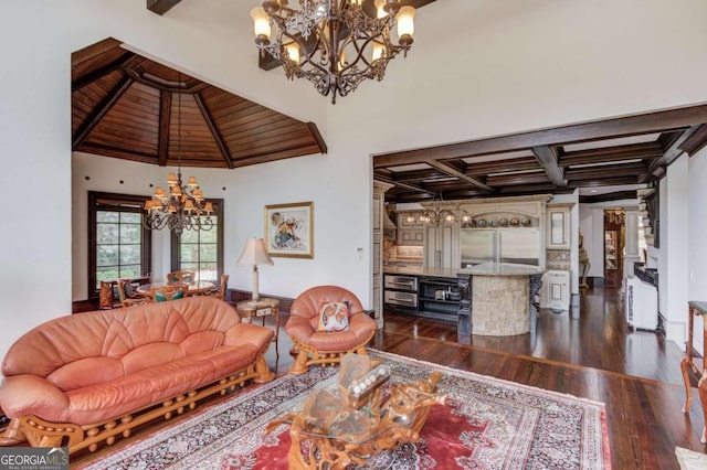 living room with coffered ceiling, a notable chandelier, dark hardwood / wood-style floors, and beam ceiling