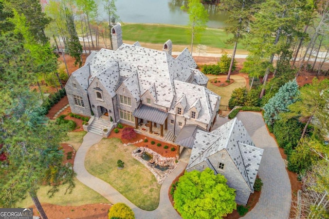 birds eye view of property featuring a water view