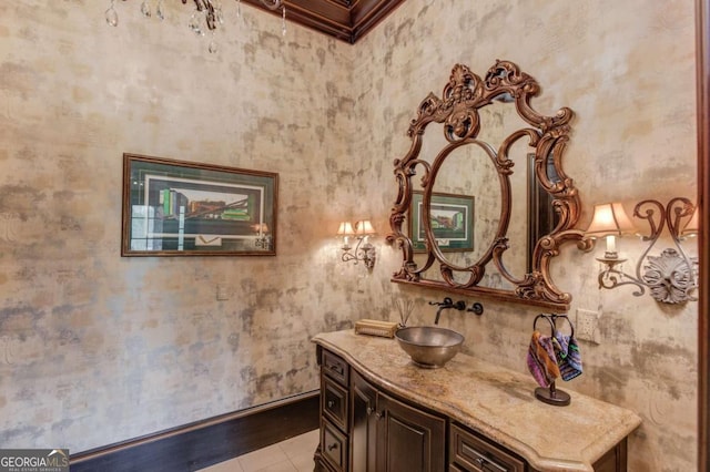 bathroom with vanity and tile flooring