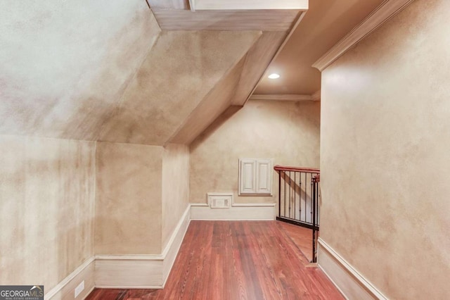 additional living space featuring dark wood-type flooring