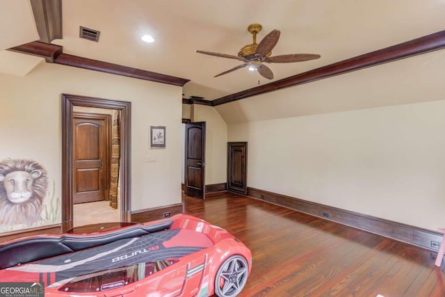 bedroom with ceiling fan, lofted ceiling with beams, and dark wood-type flooring