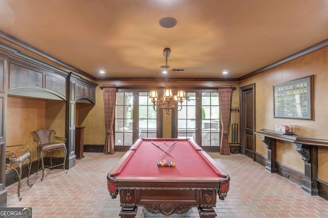 playroom with french doors, ornamental molding, billiards, and a chandelier