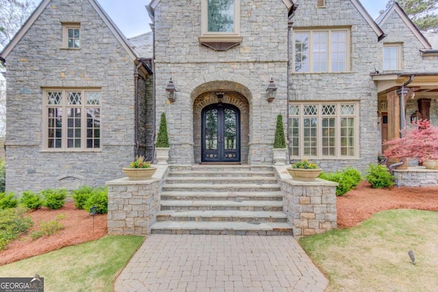 property entrance featuring french doors