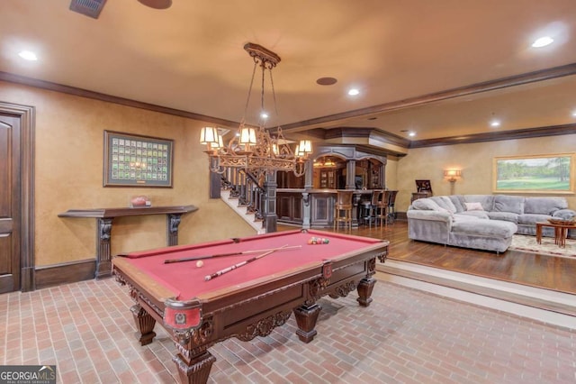 game room featuring indoor bar, ornamental molding, and billiards