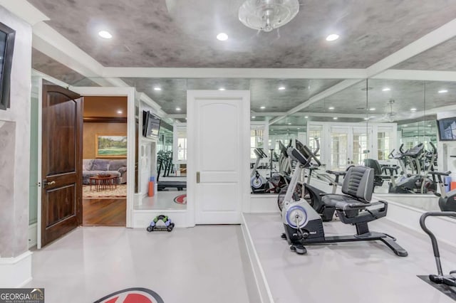 workout area with french doors, light hardwood / wood-style floors, a healthy amount of sunlight, and ceiling fan