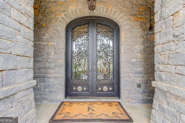 entrance to property with french doors