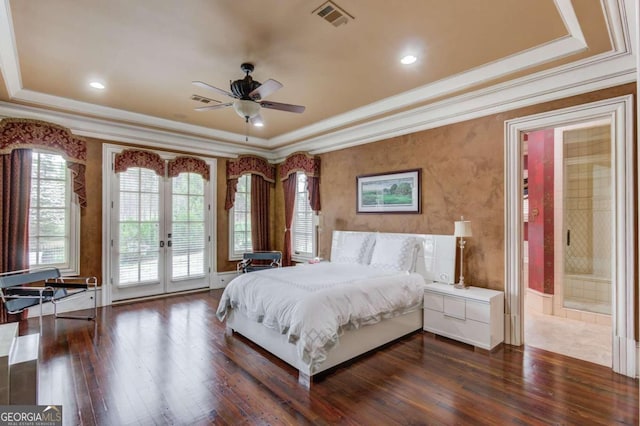 bedroom featuring french doors, ceiling fan, dark hardwood / wood-style flooring, access to outside, and a tray ceiling