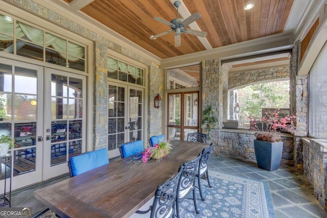 sunroom featuring wooden ceiling, french doors, and ceiling fan