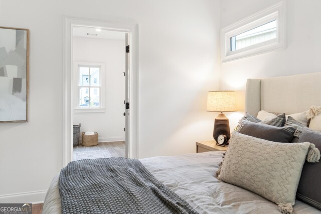 bedroom featuring hardwood / wood-style flooring