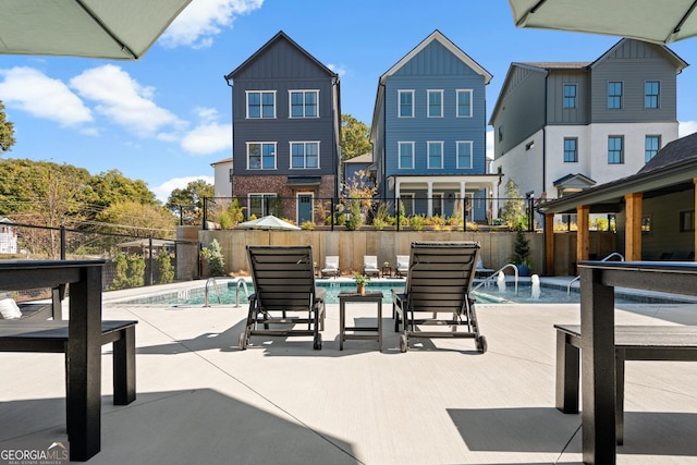 view of patio featuring a fenced in pool