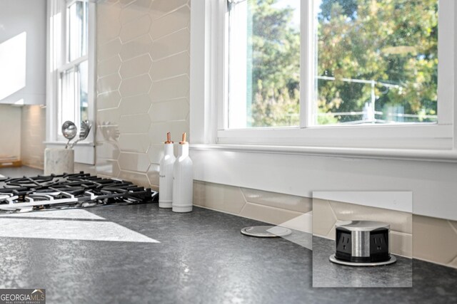 interior space featuring tasteful backsplash