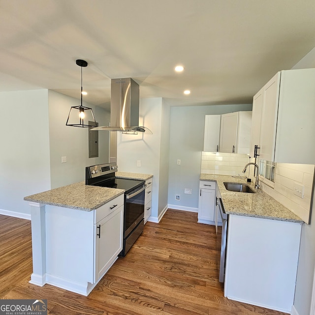 kitchen with sink, island exhaust hood, stainless steel range with electric stovetop, white cabinets, and wood-type flooring