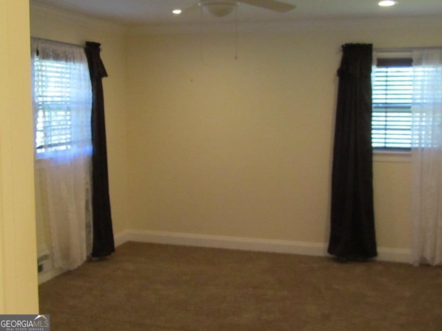 carpeted empty room with ceiling fan