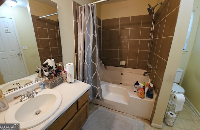 full bathroom featuring tile patterned flooring, vanity, shower / tub combo with curtain, and toilet