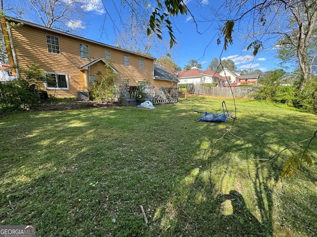 view of yard with a wooden deck