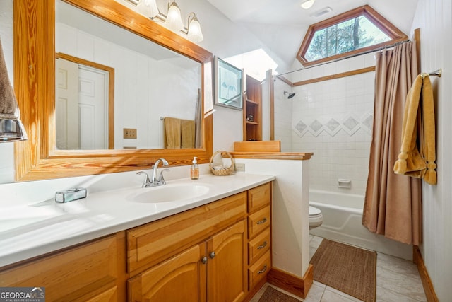 full bathroom featuring shower / tub combo, vanity, tile patterned flooring, toilet, and lofted ceiling